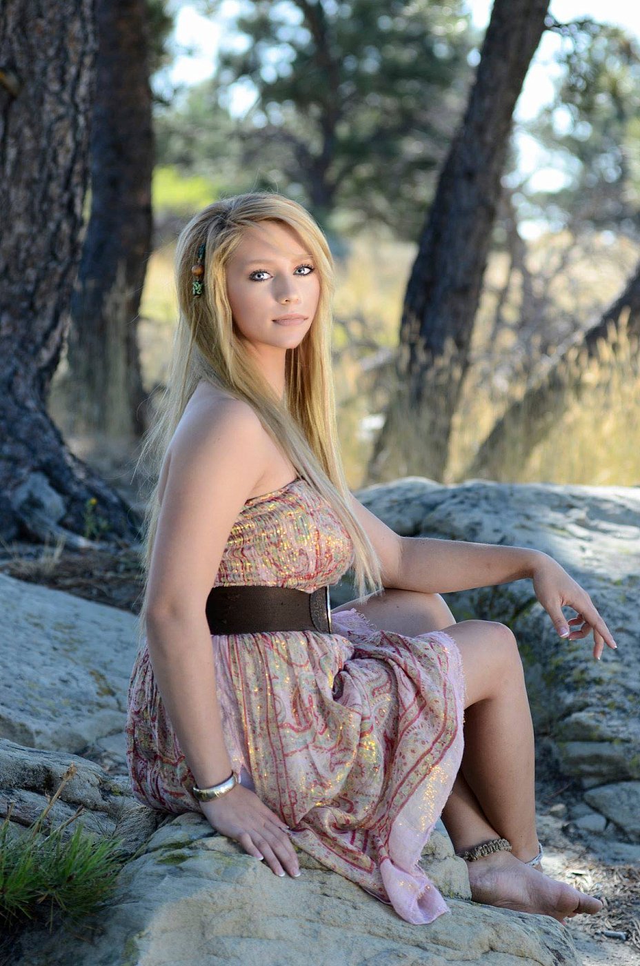High school senior portrait captured on location with natural, expressive emotion.